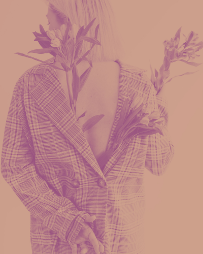 Woman with flower in clothing, referring to sustainable fashion